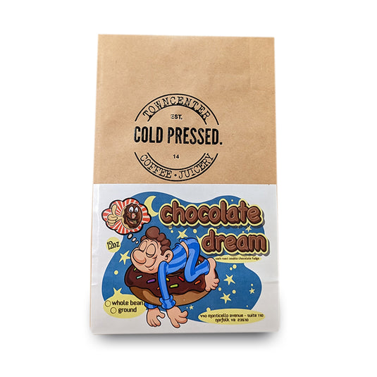 Shown here is a 12-ounce coffee bag of our Chocolate Dream Chocolate Fudge Flavored Coffee sold by Town Center Cold Pressed and proudly roasted in Norfolk, VA.