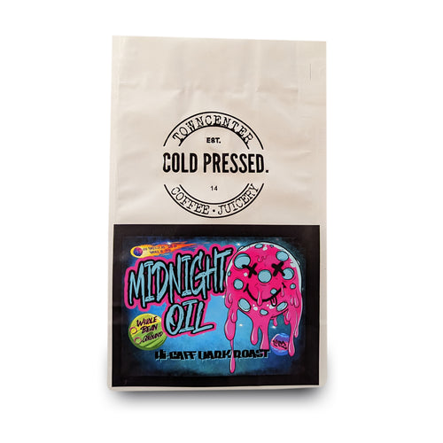 Shown here is a 12-ounce coffee bag of our Midnight Oil High Caffeine Specialty Blend Coffee sold by Town Center Cold Pressed and proudly roasted in Norfolk, VA.