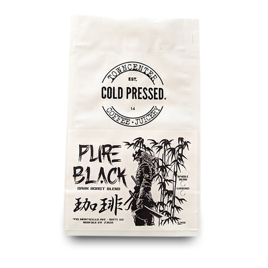 Shown here is a 12-ounce coffee bag of our Pure Black Bold Roast Coffee sold by Town Center Cold Pressed and proudly roasted in Norfolk, VA.